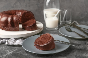 Tasty chocolate cake on table