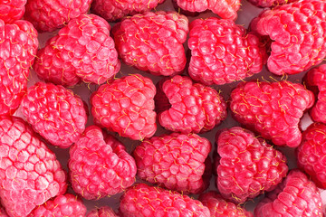 Fresh and sweet raspberries background