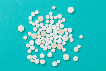 white  tablets on blue  background - Image .