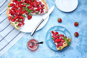 Tasty strawberry cake on color background