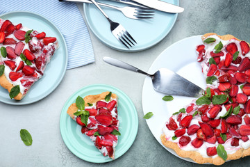 Tasty strawberry cake on color background