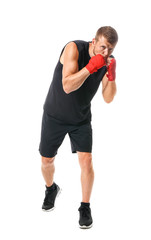 Strong male boxer on white background