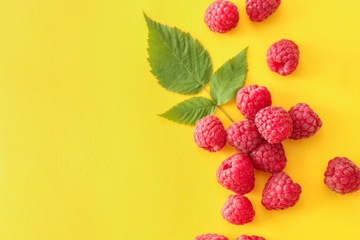 Sweet ripe raspberry on color background