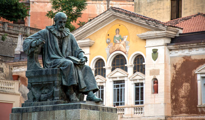 Fototapeta na wymiar Statue of Bernardino Telesio, the ancient philosopher, located in Piazza XV marzo, Cosenza - Italy