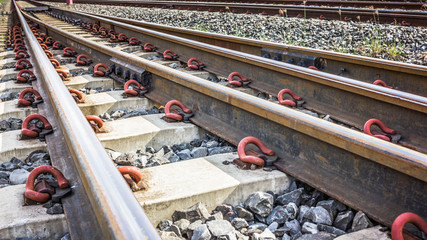 Two railway tracks merge together.