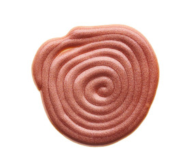 Gently beige strokes and texture of face highlighter or acrylic paint isolated on white background