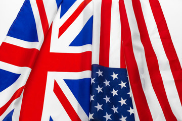 Flags of the USA and brithish Union Jack flag together waving