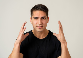 Stress and mental health, Attractive young man with angry face looking furious and desperate