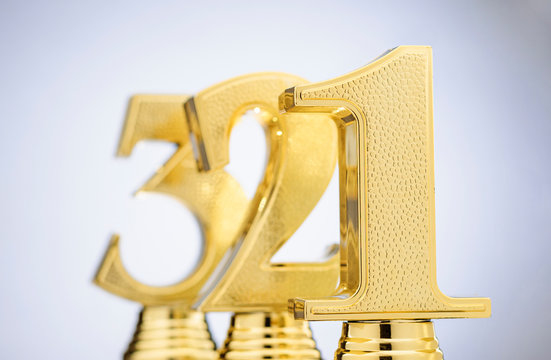 Gold trophies for the 1st, 2nd and 3rd places