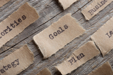 Goals word on a piece of paper close up, business creative motivation concept