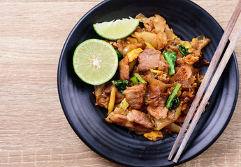 Thai food, stir fried rice noodle in soy sauce (Pad See Ew), top view