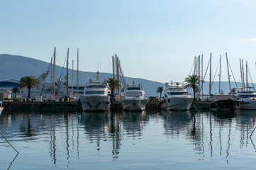 Obraz premium Porto Montenegro. Yachts in the sea port of Tivat city. Kotor bay, Adriatic sea. Famous travel destination.