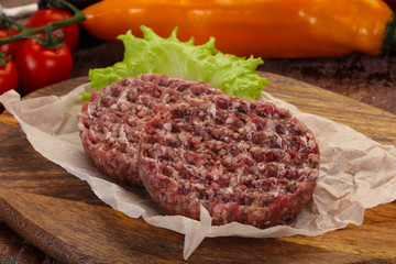 Raw burger cutlet