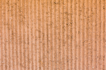 Textured old orange vintage wall. Background for design mockups. Isolated abstract decorative retro wall