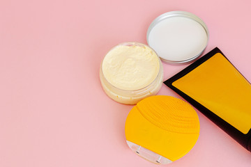 Cosmetic containers with blank labels and cleansing brush