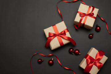 New Year Christmas celebration paper gift boxes gold sparkles with christmas balls Presents wrapped...