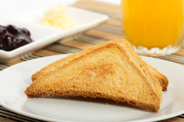 toast with butter and orange juice