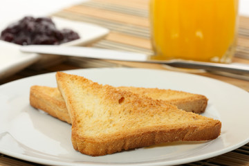 toast with jam and orange juice