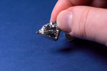 Pieces of germanium metal. Rare earth