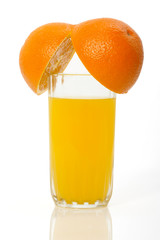 glass of juice and orange isolated on white