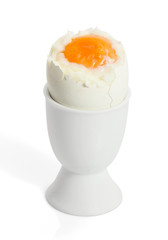 egg in cup isolated on white