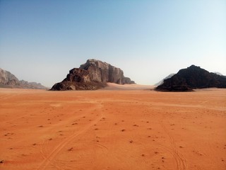 Amazing view from above on the huge, red, hot and very beautiful desert Wadi Rum. Kingdom of Jordan , Arab country in Western Asia
