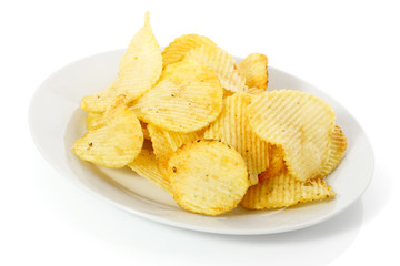 potato chips on a plate isolated on white background
