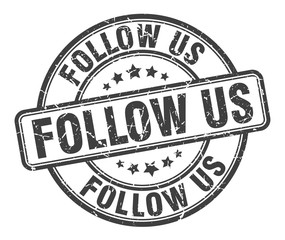 follow us stamp. follow us round grunge sign. follow us