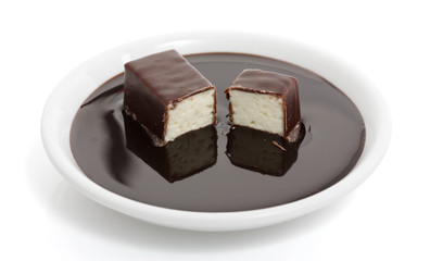 soft chocolate-covered candy filled with milk souffle