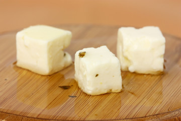 Fototapeta na wymiar Feta Cheese in Olive Oil