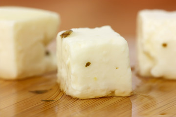 cheese on a wooden board