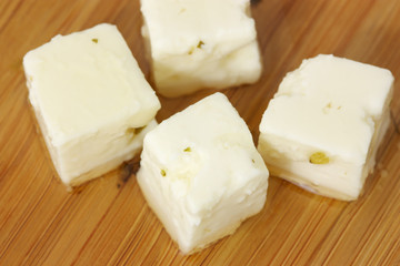 Feta Cheese on wooden board