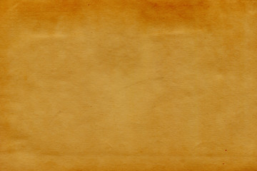 Vintage and old looking paper background. Retro cardboard texture. Grunge paper for drawing. Ancient book page.