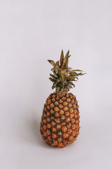 full Pineapple Sweet and leaves on a white background.