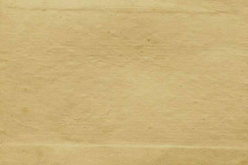 Vintage and old looking paper background. Retro cardboard texture. Grunge paper for drawing. Ancient book page.