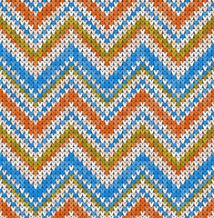 Knitting classic geometric pattern. Knitted realistic seamless background, texture. Vector seamless background for banner, site, greeting card, wallpaper. Vector Illustration.