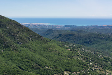 Fototapeta na wymiar View of Mediterranean Sea and surrounding mountains from village Gourdon in France.