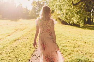 pregnant woman in summer city park