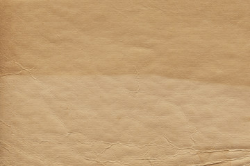 Vintage and old looking paper background. Retro cardboard texture. Grunge paper for drawing. Ancient book page.