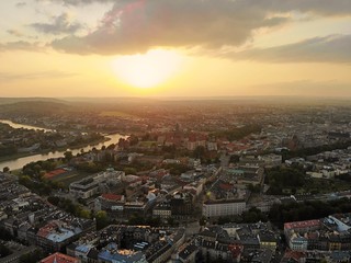 Aerial photo from drone. The culture and historical capital of Poland. Comfortable and beautiful Krakow. The land of Legend. Beautiful Sunset,old part of city.