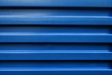 Fototapeta premium Blue background of close up steel container box.