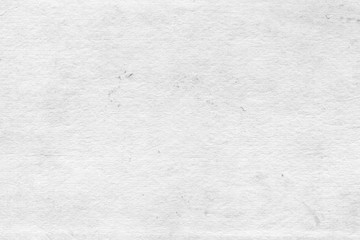 Obraz premium Vintage and old looking paper background. Retro cardboard texture. Grunge paper for drawing. Ancient book page.