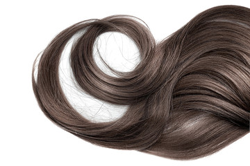Fototapeta premium Brown wavy hair isolated on white background