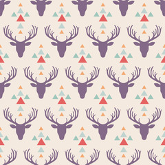 Hipster style seamless pattern with deer and triangles. Tribal vector pattern.