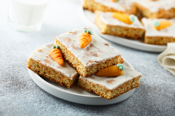 Homemade carrot cake with marzipan and sugar glaze