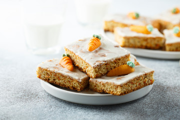 Homemade carrot cake with marzipan and sugar glaze