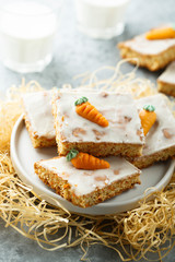 Homemade carrot cake with marzipan and sugar glaze