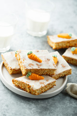 Homemade carrot cake with marzipan and sugar glaze