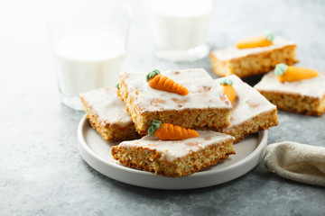 Homemade carrot cake with marzipan and sugar glaze