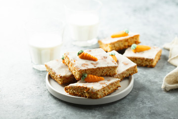 Homemade carrot cake with marzipan and sugar glaze